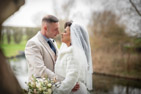 romantic photo of newlyweds by the lake at Pitch 21 Sproatley East Yorkshire