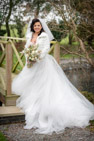 bride by the bridge at Pitch 21 after her wedding at Guildhall Hull